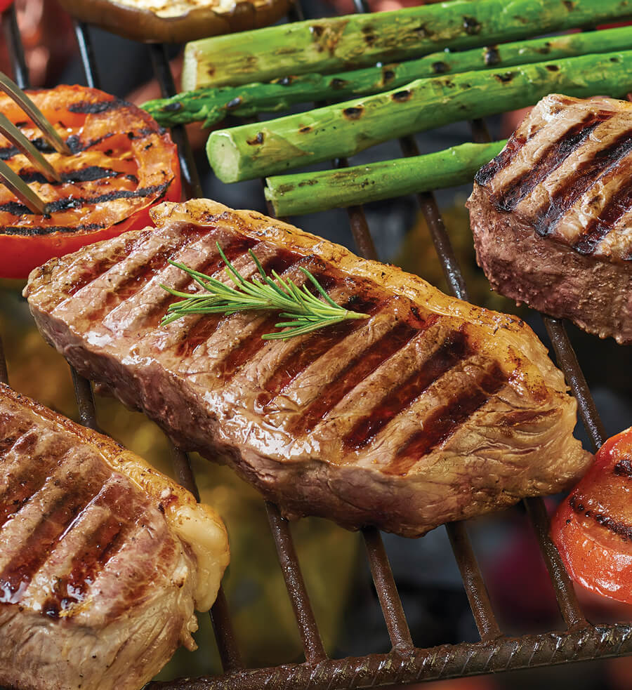 Bife de chorizo con vegetales a la parrilla